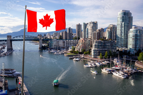 National Canadian Flag with Modern Downtown City in Background during Sunset. Taken in False Creek, Vancouver, British Columbia, Canada. Aerial Composite