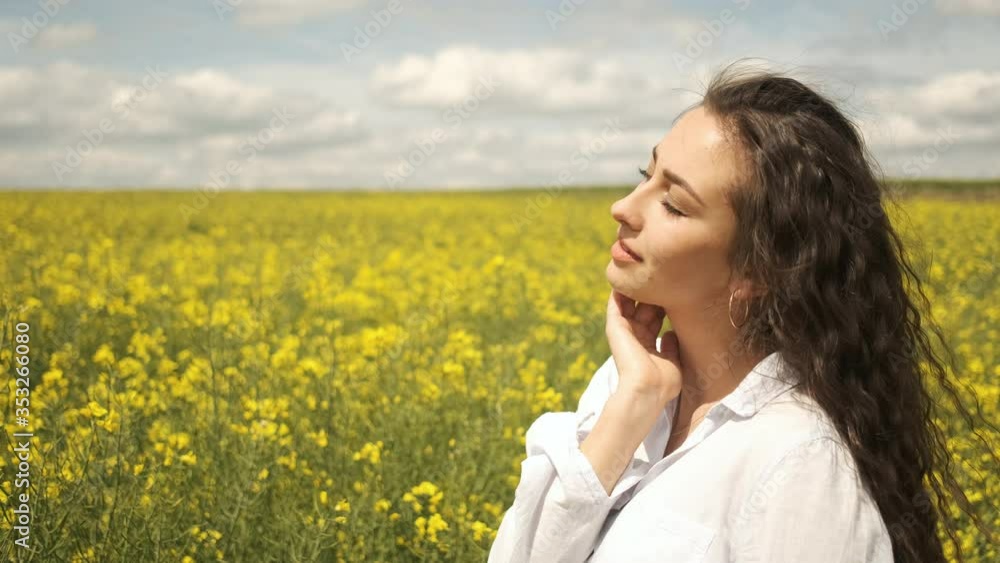 Cheerful girl of Caucasian appearance in rape posing in front of the camera