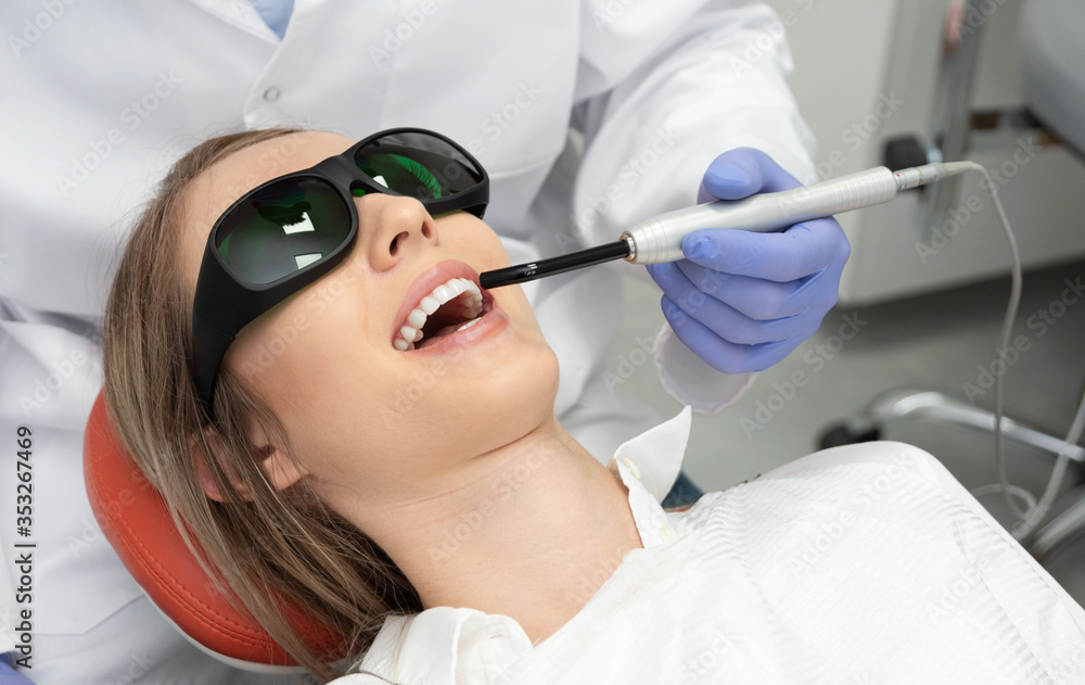 Using a modern method of laser teeth treatment Using a modern method of laser teeth treatment