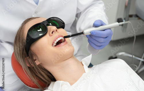 Using a modern method of laser teeth treatment