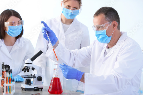 Scientists working in moder...