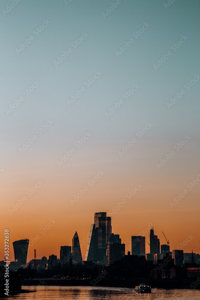 a beautiful sunset in the city of london
