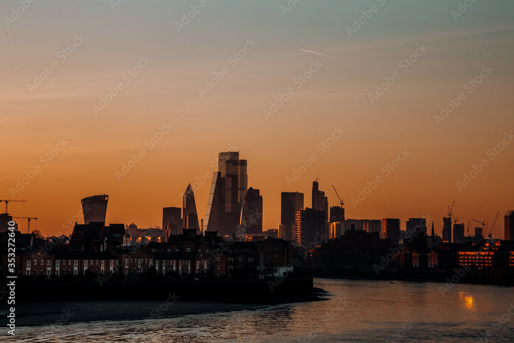 a beautiful sunset in the city of london
