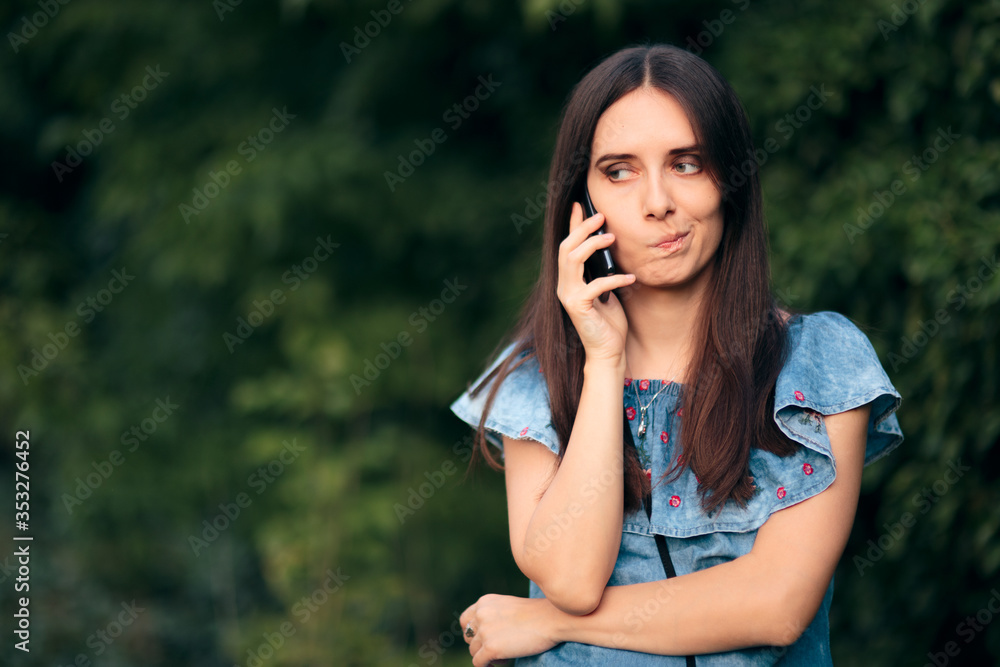 Worried Woman Talking At the Phone Outdoors Worried Woman Talking At the Phone Outdoors