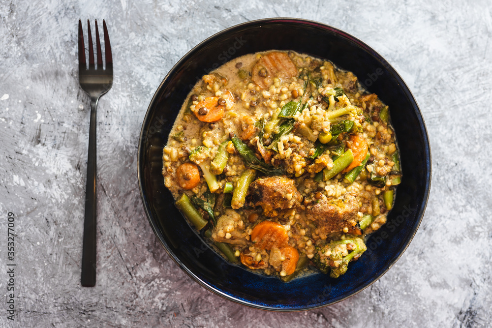 plant-based food, vegan buckwheat stew with carrots green beans and falafels plant-based food, vegan buckwheat stew with carrots green beans and falafels