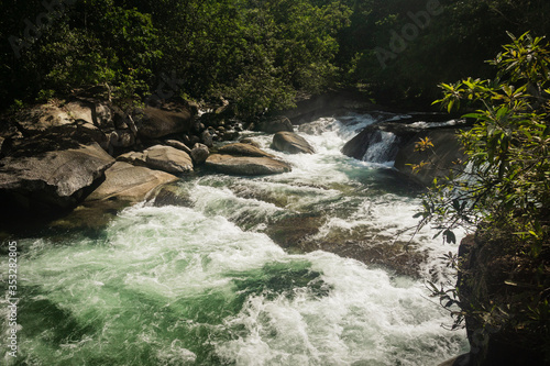 rapids flowing over rocks