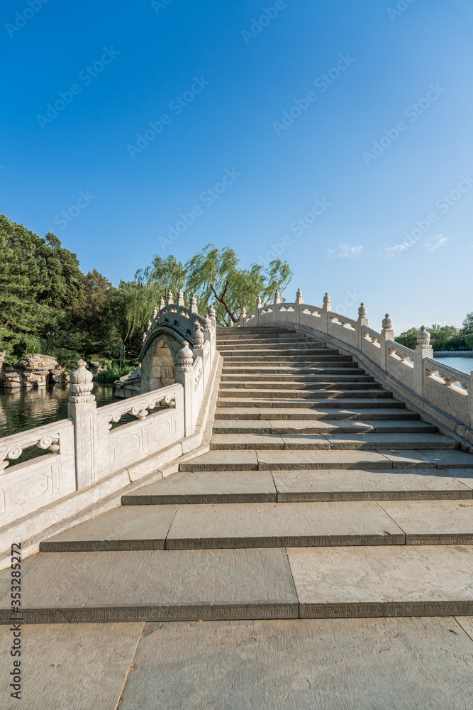 Fototapeta premium Chinese Traditional stone bridge in Beihai park, Beijing, China.