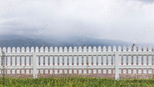 Wooden white fences around the garden