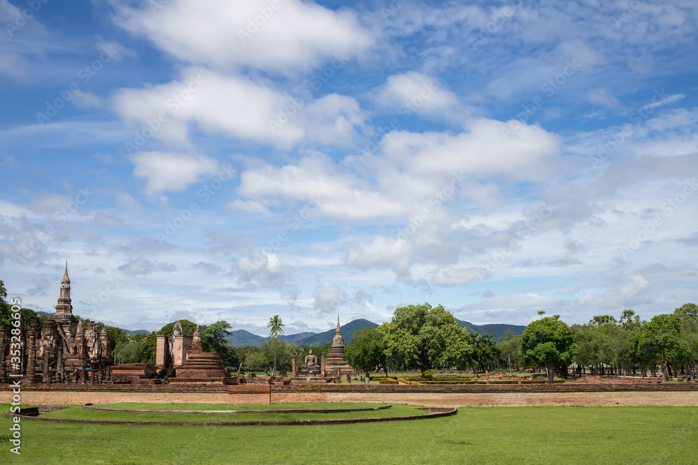 Beautiful scenery of Sukhothai Historical Park, Thailand in the morning with a sky background. Is a place that is famous and very popular with both Thai and foreigners with copy space