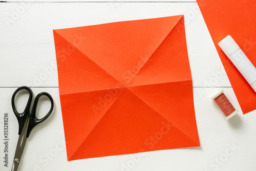 Quadro su tela Step by step instructions for making origami paper lantern on christmas tree