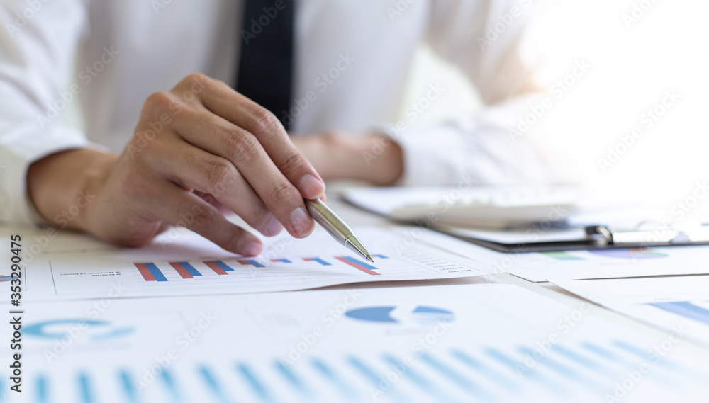 Head of marketing has analyzed the financial income graph of the company in order to develop the structure of the company to be ready for the economy in the future. Financial results analysis concept. Head of marketing has analyzed the financial income graph of the company in order to develop the structure of the company to be ready for the economy in the future. Financial results analysis concept.