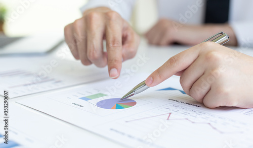 Wallpaper Mural President and the marketing staff of the company convened the earnings revenue and analysis of real estate data graph in the office, Brainstorming ideas about finance and accounting concept. Torontodigital.ca