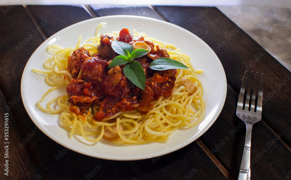 Chicken Spaghetti Tomato Sauce on Dark Background Chicken Spaghetti Tomato Sauce on Dark Background