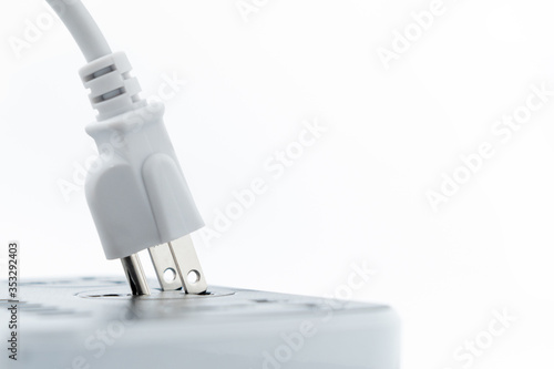 Wallpaper Mural Ready to connect. Plugging electrical, black plug in electric socket Torontodigital.ca