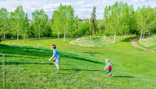 Brothers Running Up a Hill