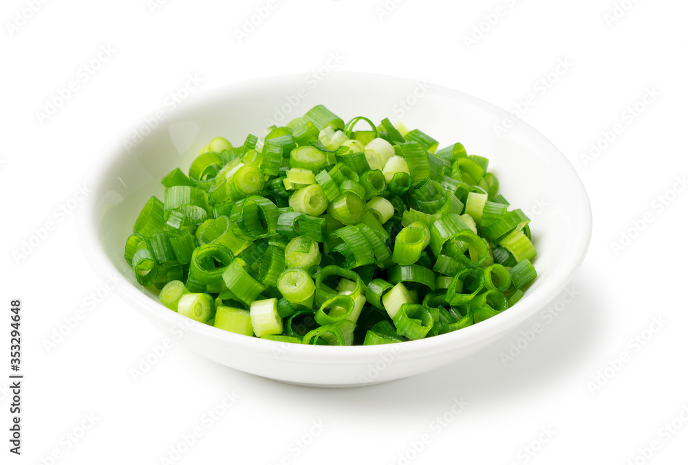 Carved green onions placed on a white background Carved green onions placed on a white background