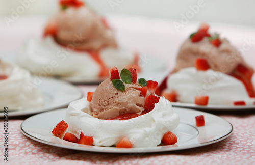 rhubarb gelato in meringue nests with strawberry coulis