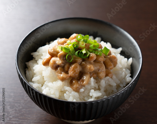 Natto and rice set against a dark wooden background