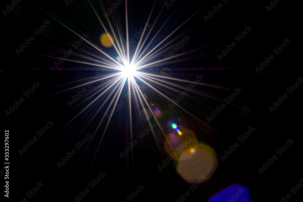 Flare color glow. Sun flash ray lens effect on black. Star spot light or  sunlight glow. Abstract bokeh lights and optical leaking reflection. Photos  | Adobe Stock