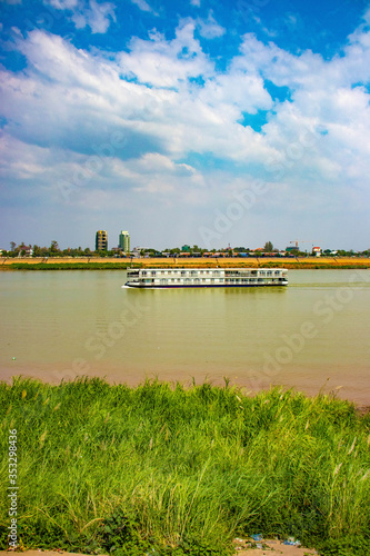 A beautiful view of boat in Mekong river at Phnom Penh, Cambodia.