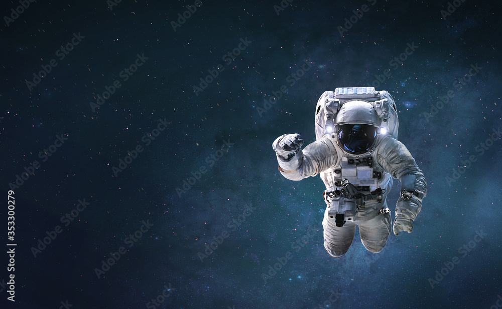 Astronaut in outer space witrh stars. Spaceman. Abstract wallpaper for science background. Elements of this image furnished by NASA Astronaut in outer space witrh stars. Spaceman. Abstract wallpaper for science background. Elements of this image furnished by NASA