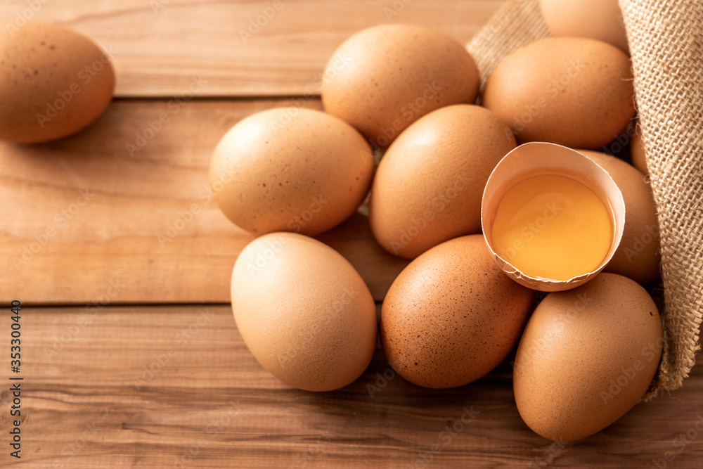 fresh brown chicken eggs on wooden background fresh brown chicken eggs on wooden background