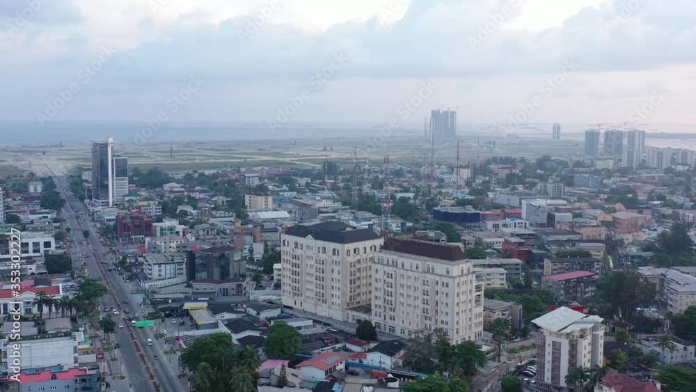Smooth orbiting aerial (drone) shot across Akin Adesola Street, Victoria Island, in the late evening Smooth orbiting aerial (drone) shot across Akin Adesola Street, Victoria Island, in the late evening