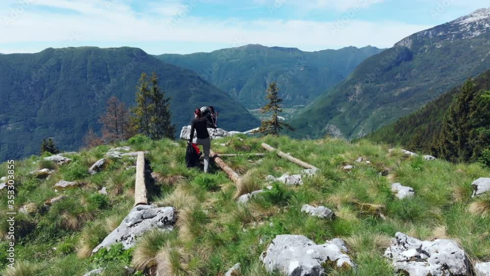 Two caucasian female friends, on top of the mountain, mountain peak. Having fun after hiking, 4K. Two caucasian female friends, on top of the mountain, mountain peak. Having fun after hiking, 4K.