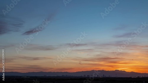 Sunset time lapse of the beautiful strip skyline with red clouds
