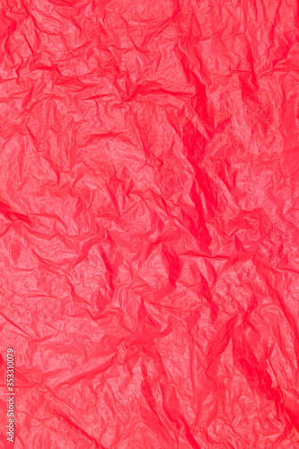 crumpled red plastic bag texture background surface