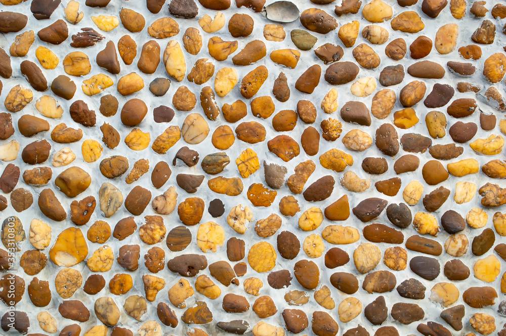 gravel  pebble stone on concreate wall