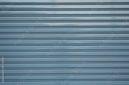 gray corrugated metal sheet,white Slide door ,garage door