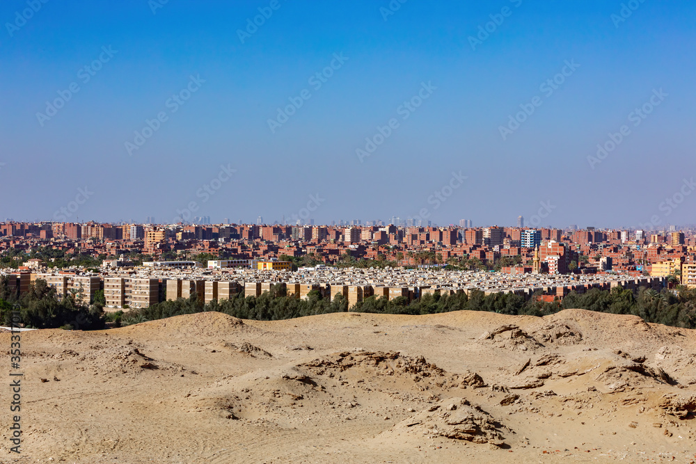 View of the panorama Cairo city skyline from Pyramids in the Giza Plateau, Egypt