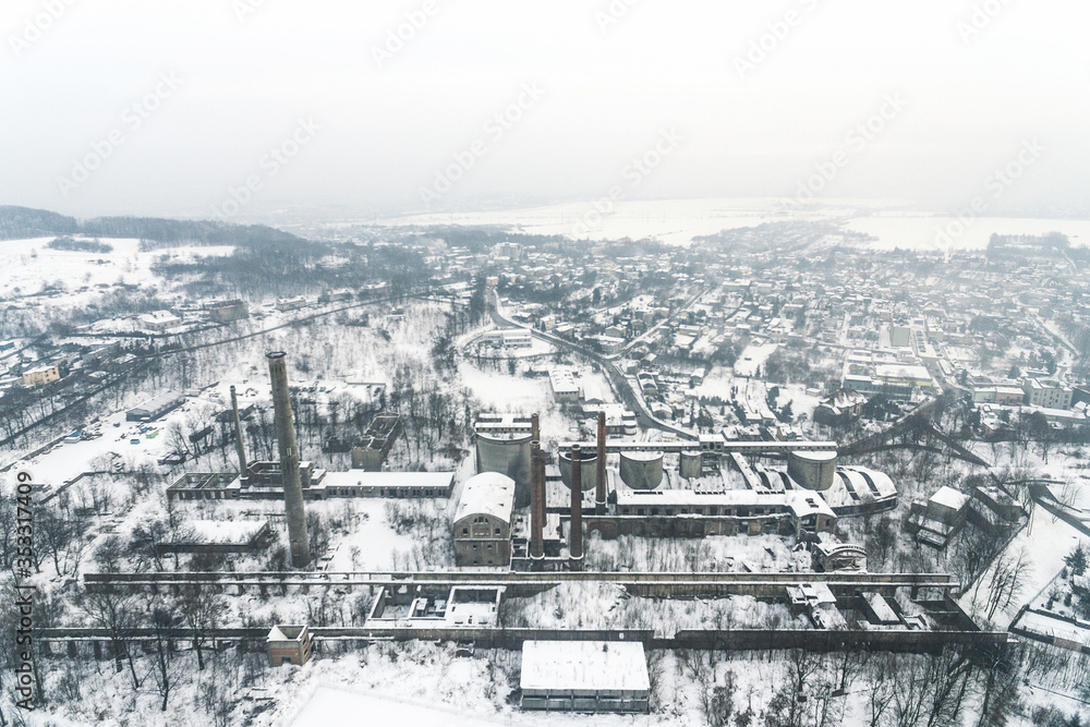 Old abandoned cement factory winter snow time in Bedzin Poland aerial drone photo