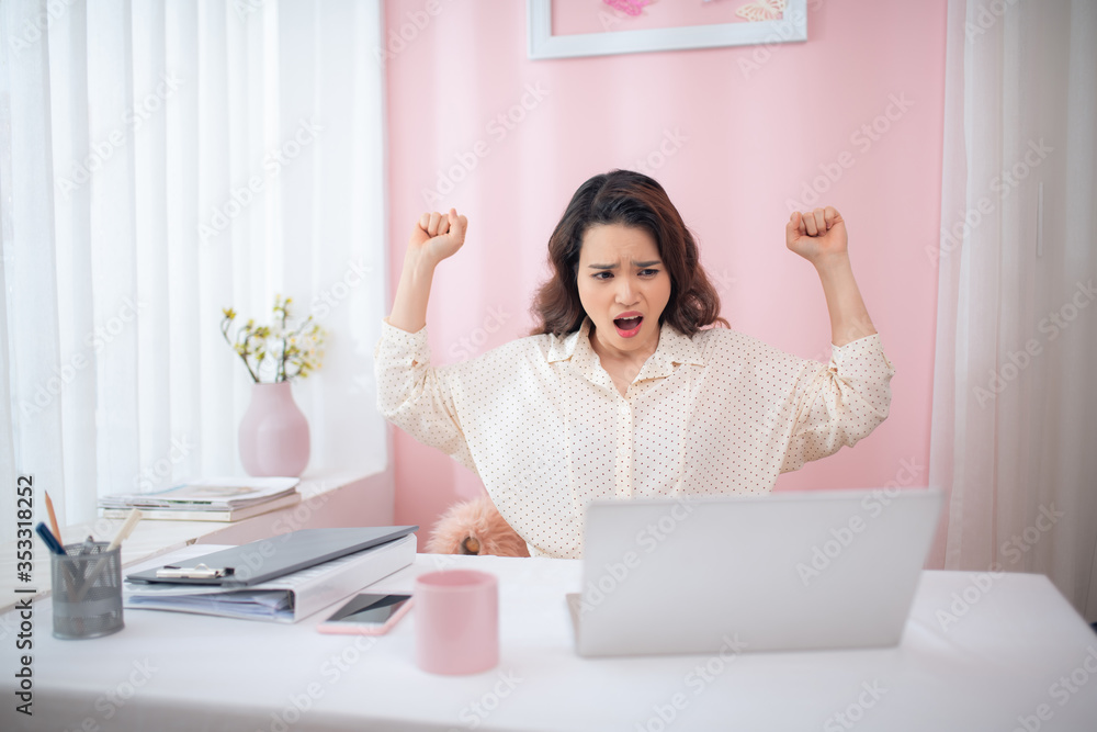 Businesswoman yawning while sitting in office Businesswoman yawning while sitting in office