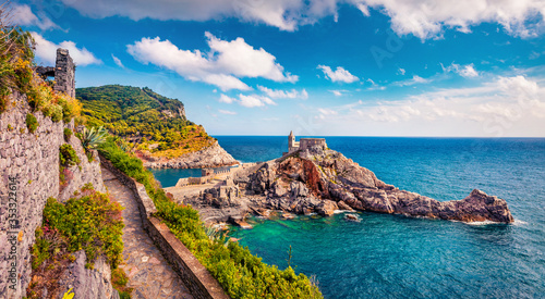 Fototapeta Naklejka Na Ścianę i Meble -  Impressive summer view of Saint Peter Church in Portovenere town. Picturesque morning seascape of Mediterranean sea, Liguria, province of La Spezia, Italy, Europe. Traveling concept background.