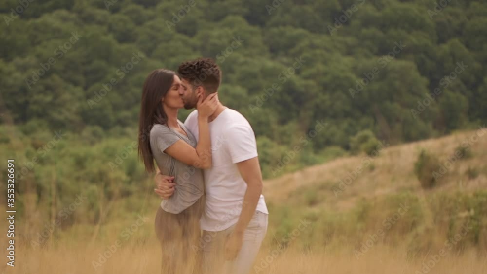 Pretty young couple in love outside in spring nature Pretty young couple in love outside in spring nature
