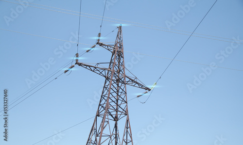 Power line at the blue sky. High voltage towers