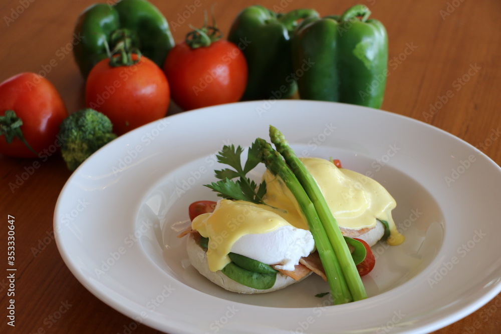 Eggs benedicts, Poached eggs on brioche bun,
turkey bacon, asparagus and
top with hollandaise sauce Eggs benedicts, Poached eggs on brioche bun,
turkey bacon, asparagus and
top with hollandaise sauce