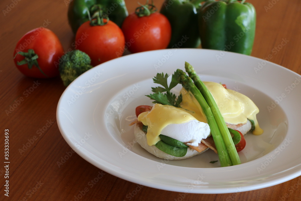 Eggs benedicts, Poached eggs on brioche bun,
turkey bacon, asparagus and
top with hollandaise sauce Eggs benedicts, Poached eggs on brioche bun,
turkey bacon, asparagus and
top with hollandaise sauce