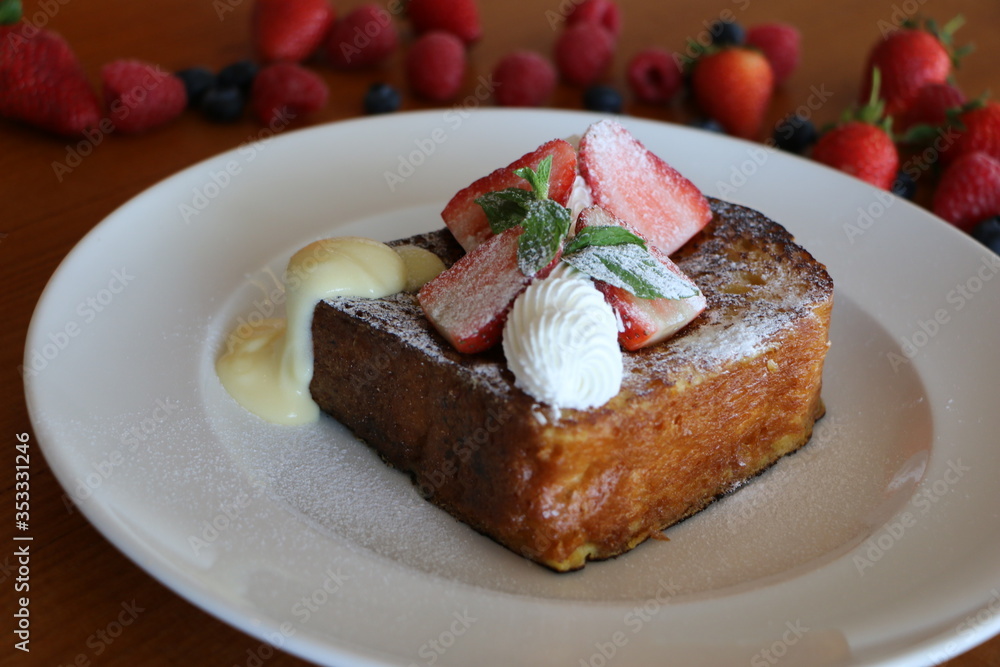 French Toast, Baked brioche layered with whipped cream,
strawberry, nuts and cream anglaise French Toast, Baked brioche layered with whipped cream,
strawberry, nuts and cream anglaise
