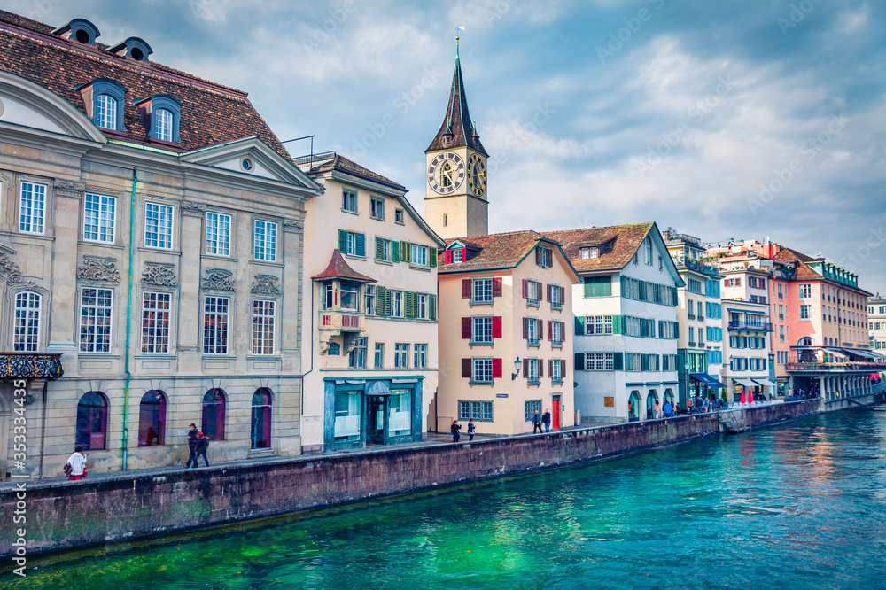 Amazing morning view of Fraumunster Church. Bright autumn cityscape of Zurich, Switzerland, Europe. Stunning landscape of Limmat River. Traveling concept background.