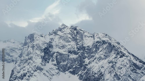 Mountains scenery: Beautiful winter Dombai cinematic view. PAN to right.

Dombai-Ulgen or Dombay-Ulgen (Georgian: დომბაი-ულგენი; Russian: Домбай-Ульген, Karachay-Balkar: Доммай ёлген) is a 4,046-metre
