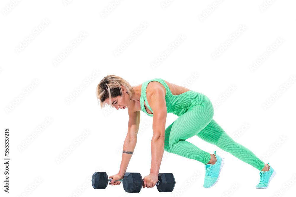 Fit sexy woman doing plank exercise on dumbbells isolated over white background. Fit sexy woman doing plank exercise on dumbbells isolated over white background.