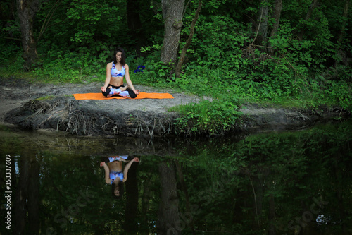 Yoga position in the forest 