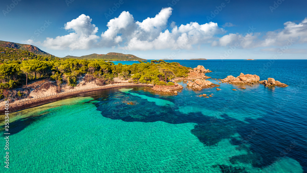 Foto Stock View from flying drone. Aerial summer scene of Tamaricciu beach.  Picturesque morning view of Corsica island, France, Europe. Nice  Mediterranean seascape. Beauty of nature concept background. | Adobe Stock