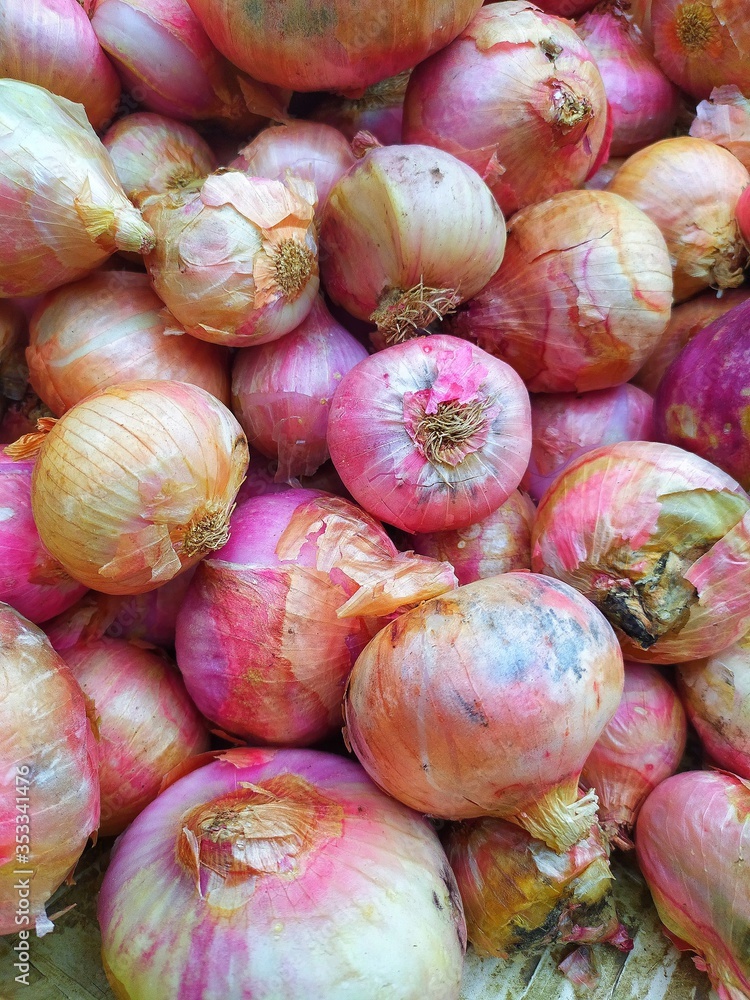fresh pink onions as a background, closeup fresh pink onions as a background, closeup