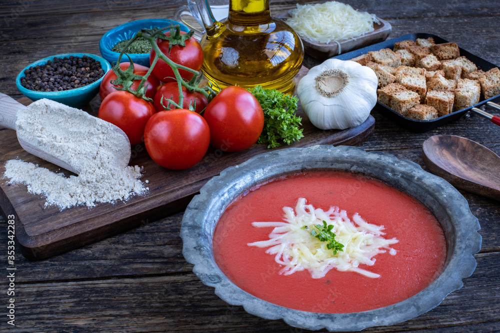 Tomato soup with cheese on the table Tomato soup with cheese on the table