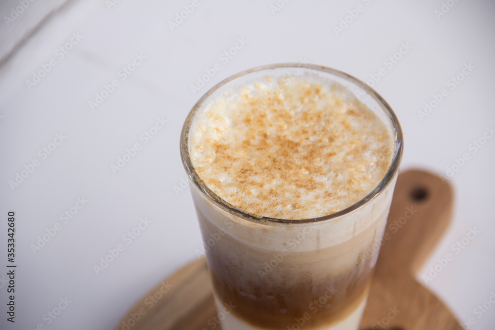Coffee Latte on Wooden Table Coffee Latte on Wooden Table