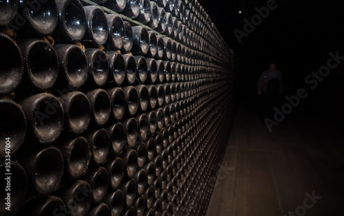 Bottles resting on lies in the cellar of Bollinger